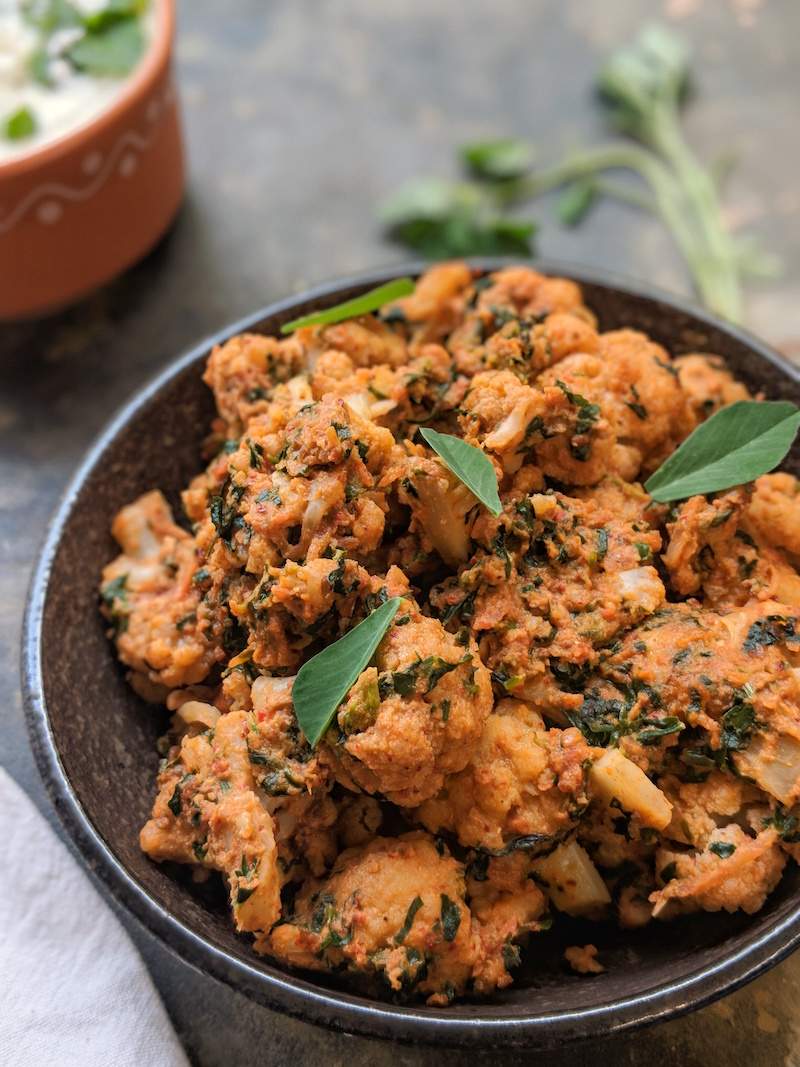 Vegan Cauliflower Curry with Greens with warming Indian spices