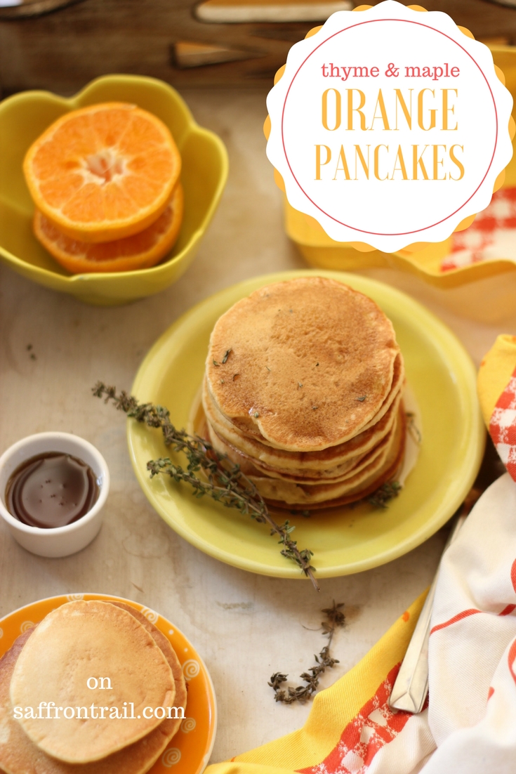 Easy to whip up orange pancakes flavoured with thyme, maple syrup and a secret ingredient that makes them extra orangey!!